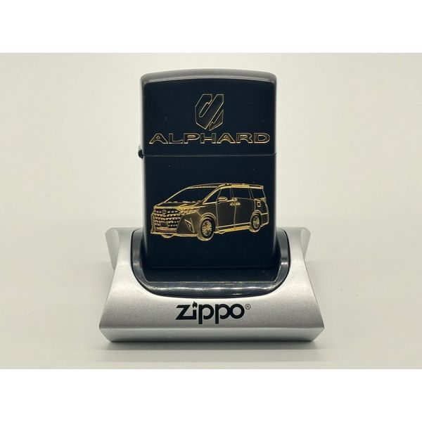 g^ Zippo At@[h